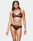 Black sheer tulle demi bra and panty set with scalloped lace trim and straps