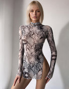 Black and white mesh high-neck dress with long sleeves and high side slit