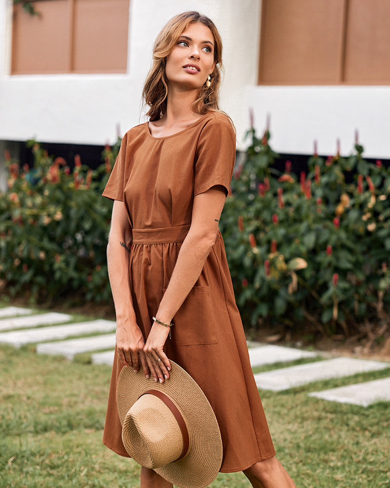 Caramel open-back midi dress with short sleeves and front patch pocket details