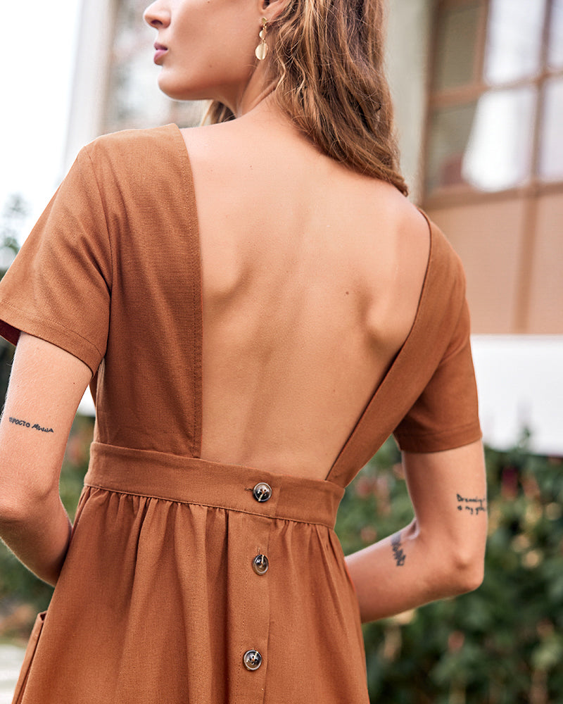 Caramel open-back midi dress with button-down back panel and short sleeves