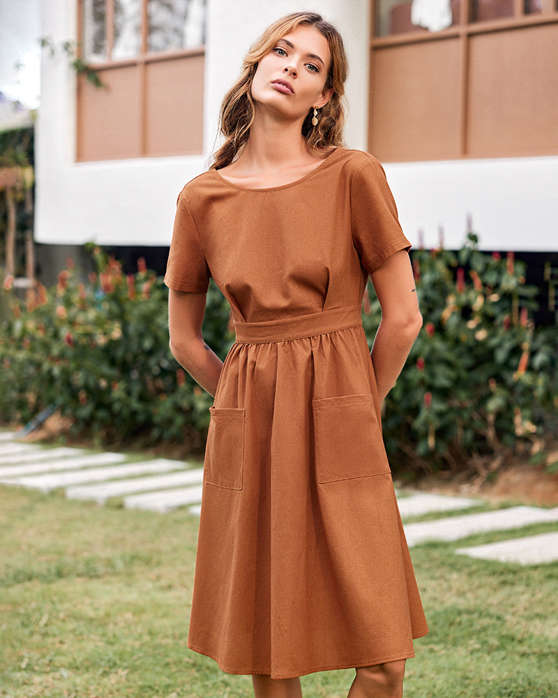 Caramel open-back midi dress with short sleeves, elastic waist, front patch pockets