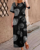 Black two-piece set with loose T-shirt and wide-leg pants, gray circular print