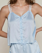 Light blue satin sleep tank with lace-trim straps and vertical button placket