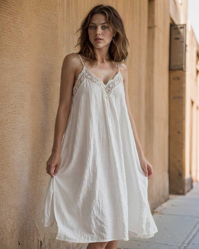 White nightdress with lace-trim bodice, thin straps, and A-line skirt