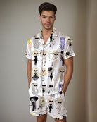 Satin pajama set with illustrated figure print short-sleeve button-up shirt and shorts