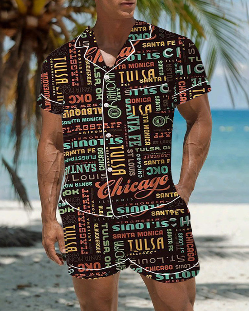 Men’s satin pajama top and shorts with colorful retro city-word graffiti pattern on dark fabric