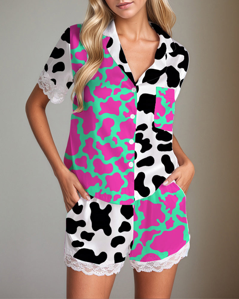 Satin pajama set, cow print short-sleeve top and lace-trim shorts, white with black