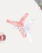 Pink and white lace g-string thongs with scalloped lace edges