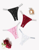 Set of lace low-rise panties with glitter trim straps: black, red, pink, and white