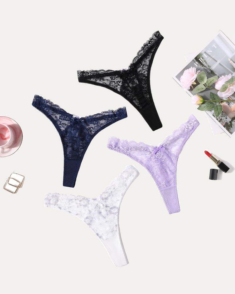 Four lace g-string thongs: black, navy, lavender, white