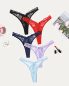 Five lace g-string thongs: black, navy, red, lavender, light blue