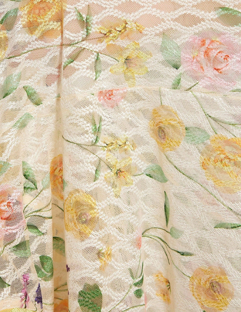 Floral embroidered mesh fabric with yellow, green, pink, and purple accents