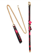 Red bat-wing choker and matching leash with gold chain links