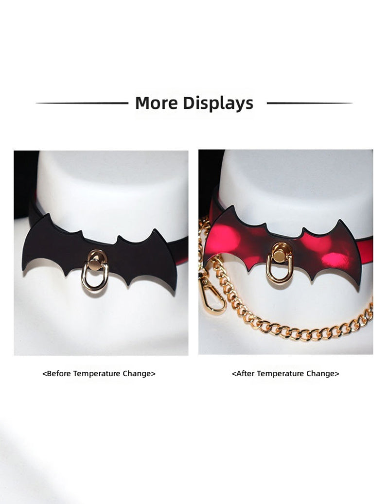 Color-changing bat-wing choker with chain leash, before/after temperature change