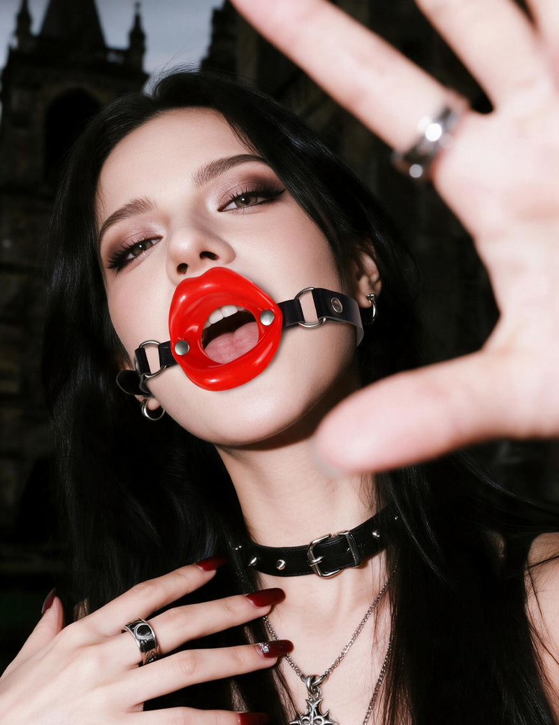 Black adjustable ring gag choker with red mouth ring and metal studs