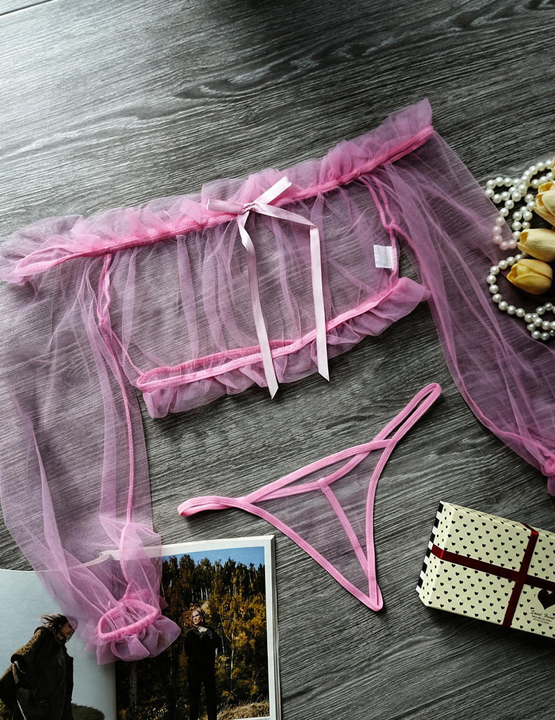 Pink sheer off-shoulder crop top and matching crotchless thong set, flat lay