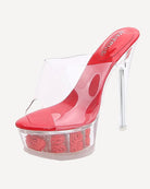 Red clear platform mule slide with rose-decorated sole and high heel