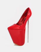 Red patent platform stiletto pump with pointed toe and tall thin stiletto heel