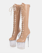 Apricot knee-high patent lace-up stiletto boots with clear platform heel