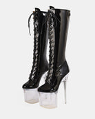 Black knee-high patent lace-up stiletto boots with clear platform heel
