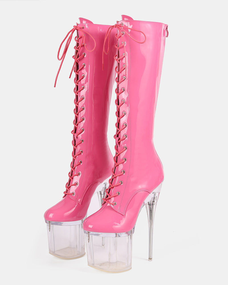 Pink knee-high patent lace-up stiletto boots with clear platform heel
