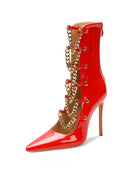 Red patent stiletto ankle boot with gold chain trim and pointed toe.