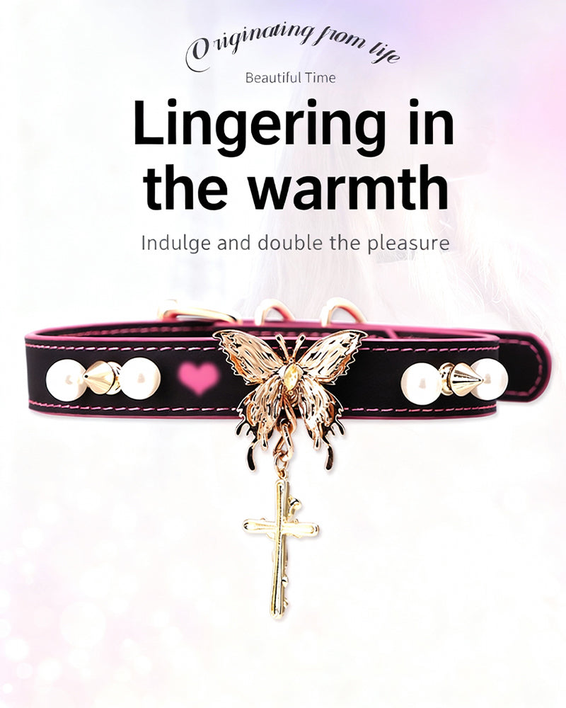 Black leather choker with butterfly center pendant, heart studs, and pearl bow accents