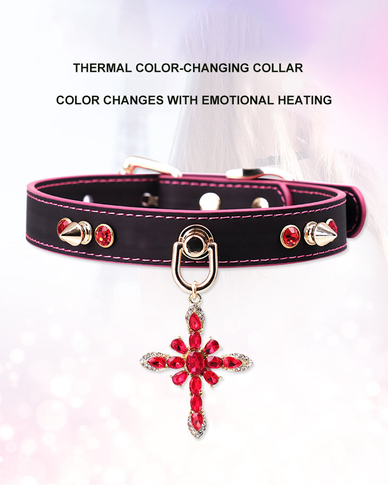 Black PU pet collar with magenta trim, metal buckle, and hanging red jeweled cross charm
