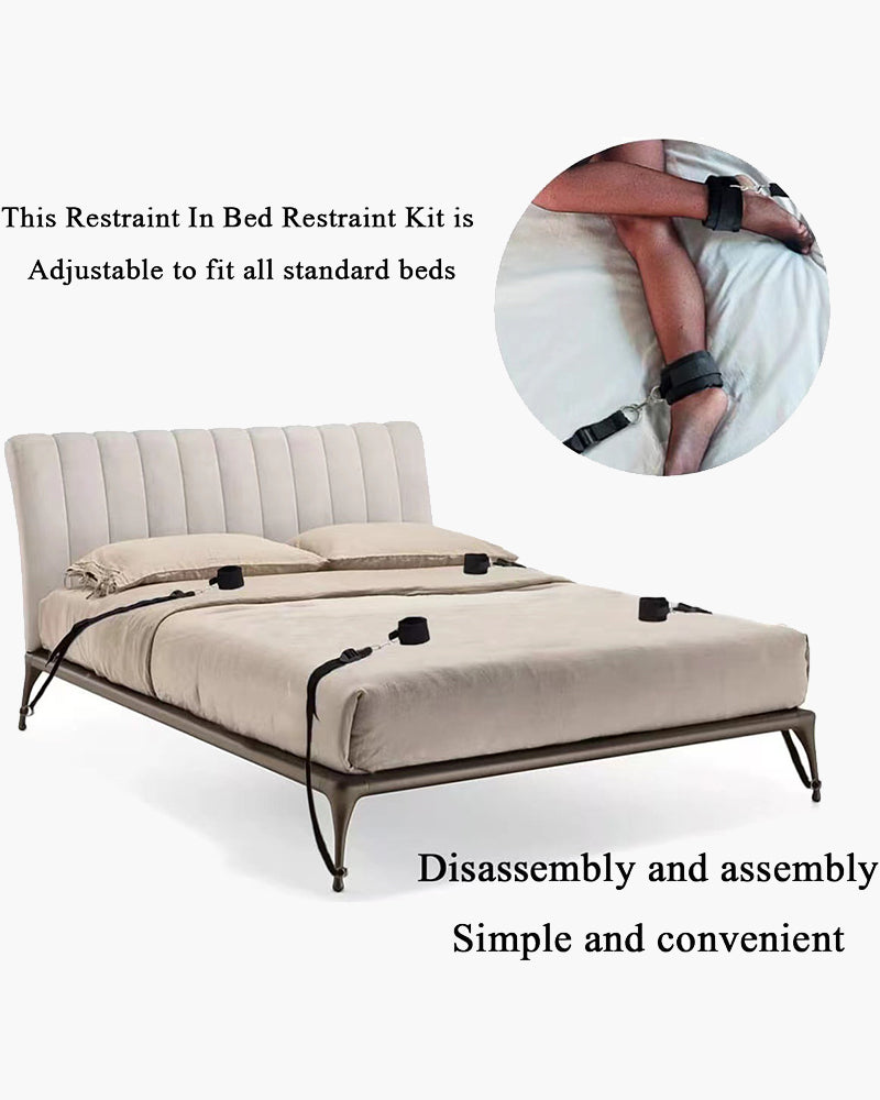 Black bed restraint kit with adjustable straps and cuff attachments