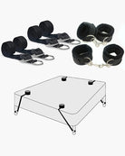 Black bed restraint straps and cuff attachments with metal rings and carabiners