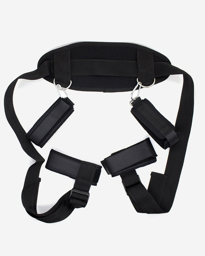 Black plush leg-split toy set with waistband, straps, and metal buckles