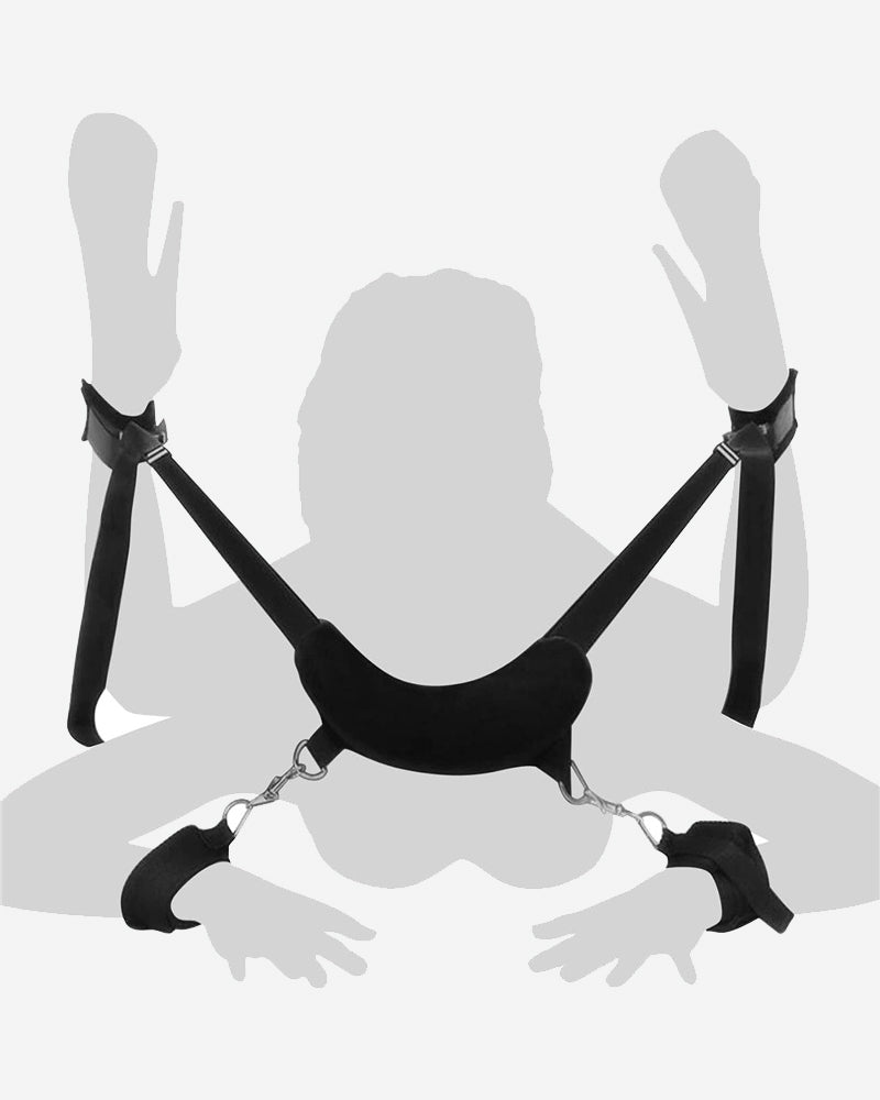 Black plush leg-split toy with handcuff-style cuffs, leg restraints, and rings