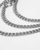 Layered silver chain necklace with linked loops detail