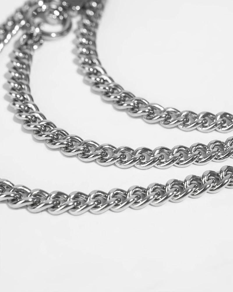 Layered silver chain necklace with linked loops detail