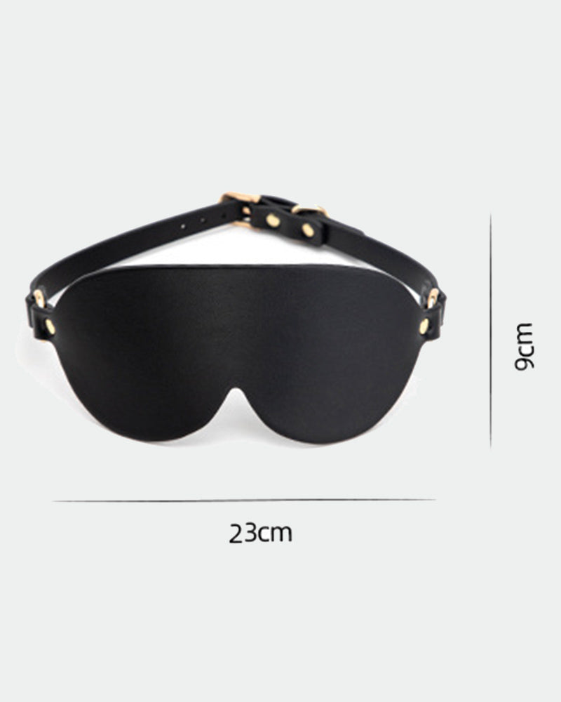 Black leather eye mask size 23cm wide and 9cm tall, with curved eye cups and strap