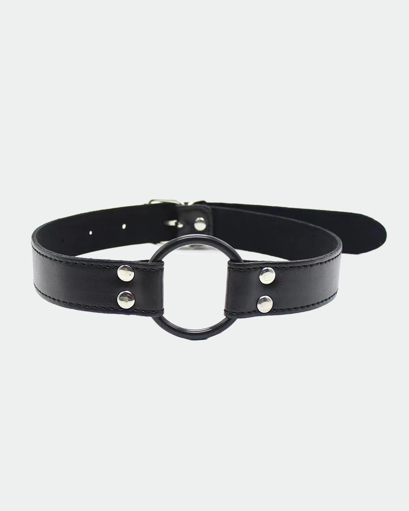 Black leather neck collar with metal ring and adjustable strap studs