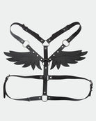 Black leather wing harness with straps, metal rings, and V-front chest support