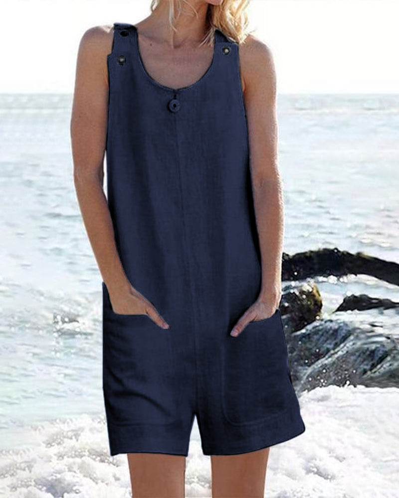 Dark blue sleeveless pocket shorts jumpsuit with button placket and scoop neckline