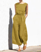 Yellow sleeveless long jumpsuit with crew neck, elastic waist, wide legs