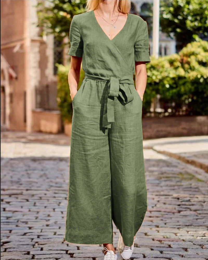 Green romper jumpsuit with V-neck, short sleeves, waist tie belt, wide-leg pants