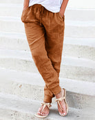 Brown drawstring jogger pants with front pockets