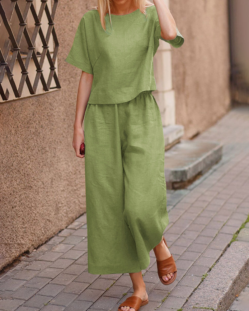 Light green loose two-piece set: short-sleeve top and wide-leg cropped pants