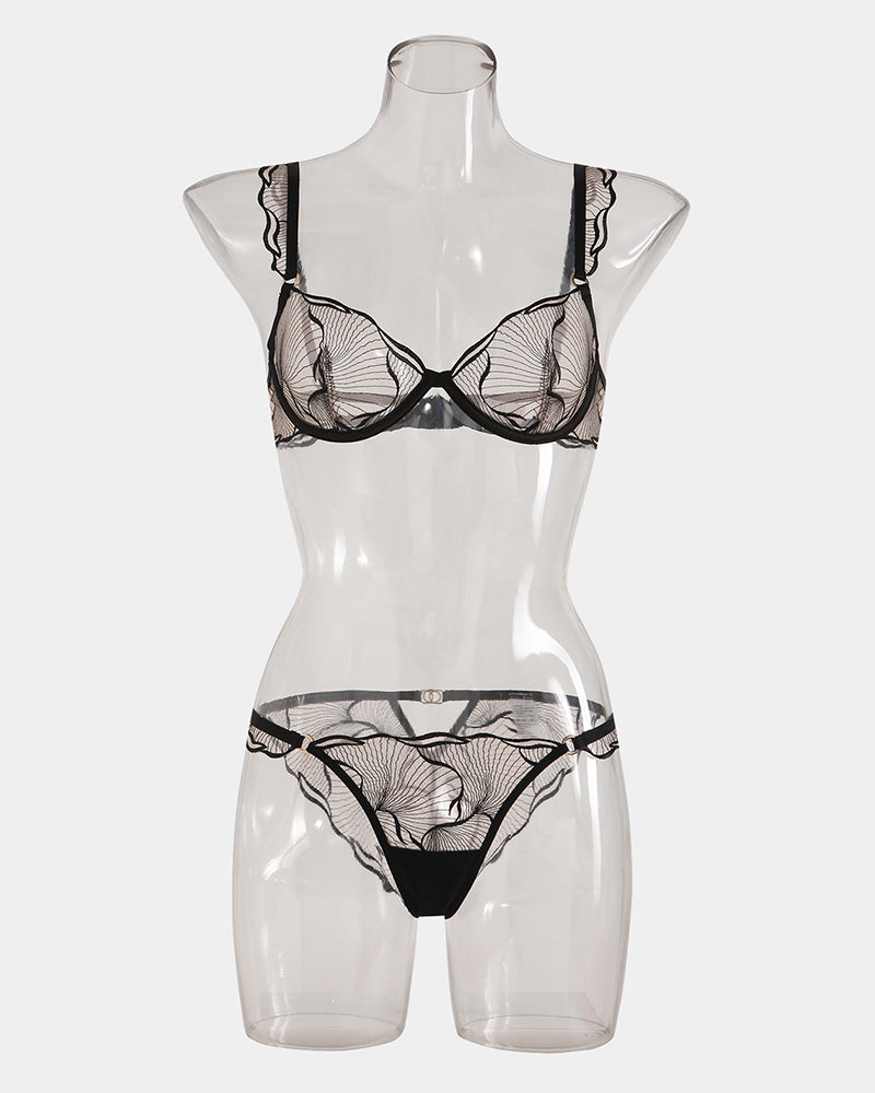 Black underwire lace bra and matching panty set with ruffled shoulder straps