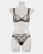 Black underwire lace bra and matching panty set with ruffled shoulder straps