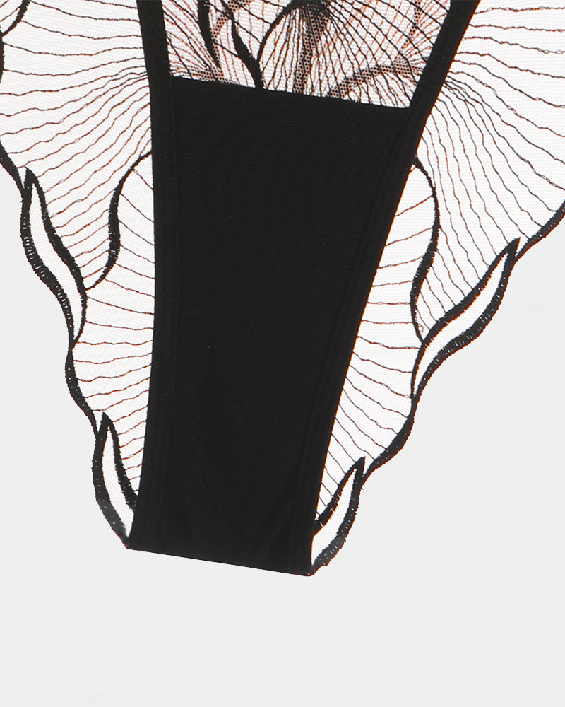 Black smooth-front thong panty with sheer lace sides