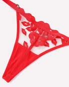 Red thong with kiss-print lace mesh panel and scalloped trim