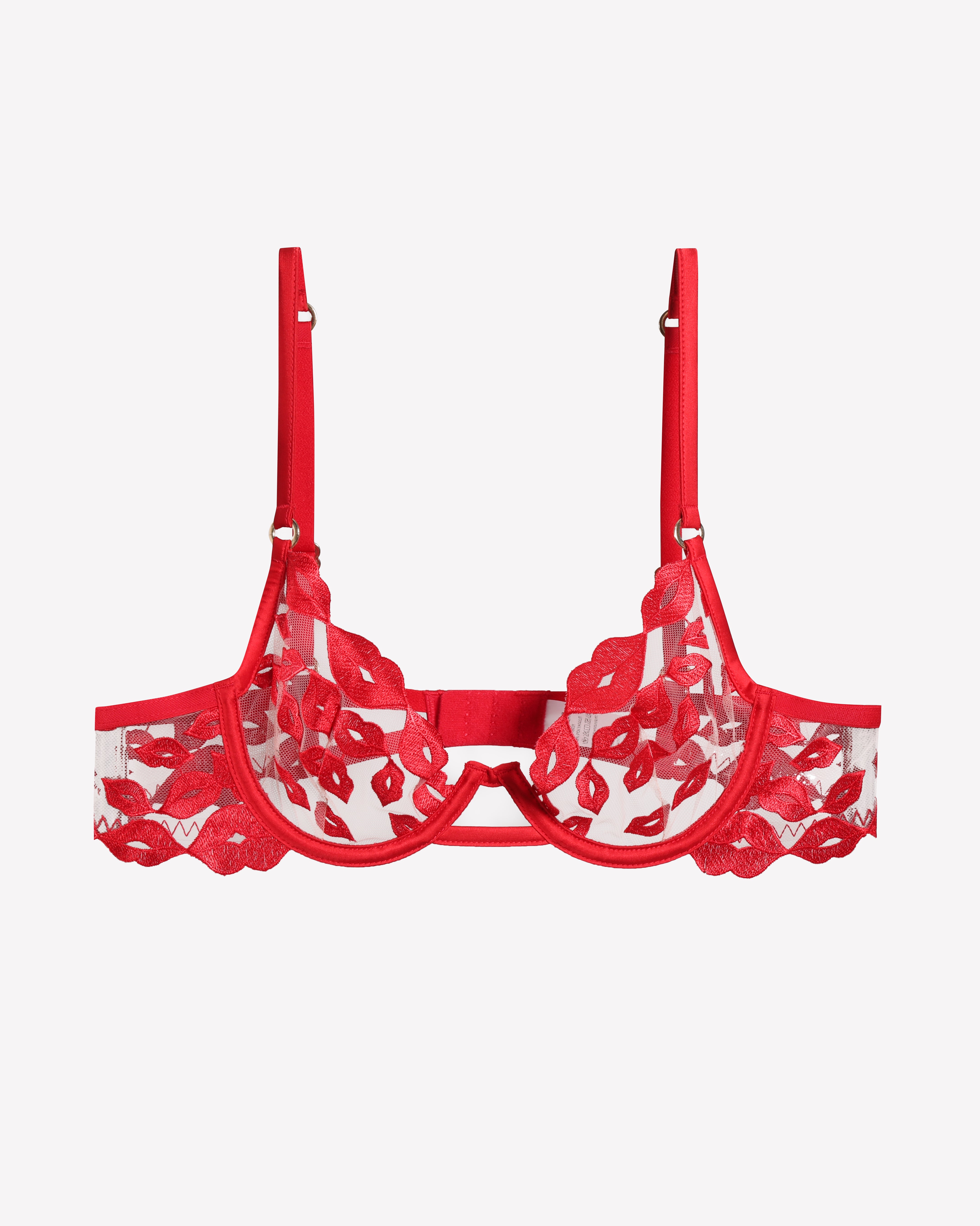 Red lace bra with kiss-print embroidery, scalloped cups, and adjustable garter straps
