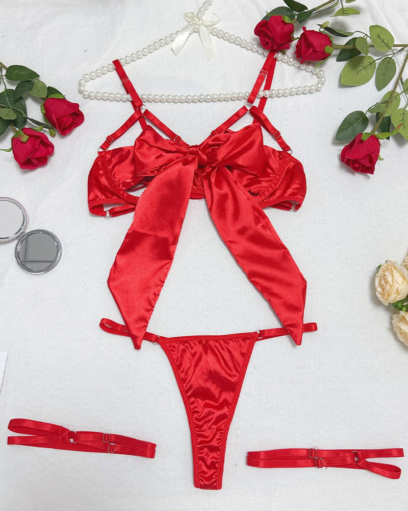 Red bow strappy lingerie set: satin top, thong, and adjustable garter straps
