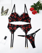 Lace bra and garter belt set, black with red heart and lip embroidery; underwear and leg straps