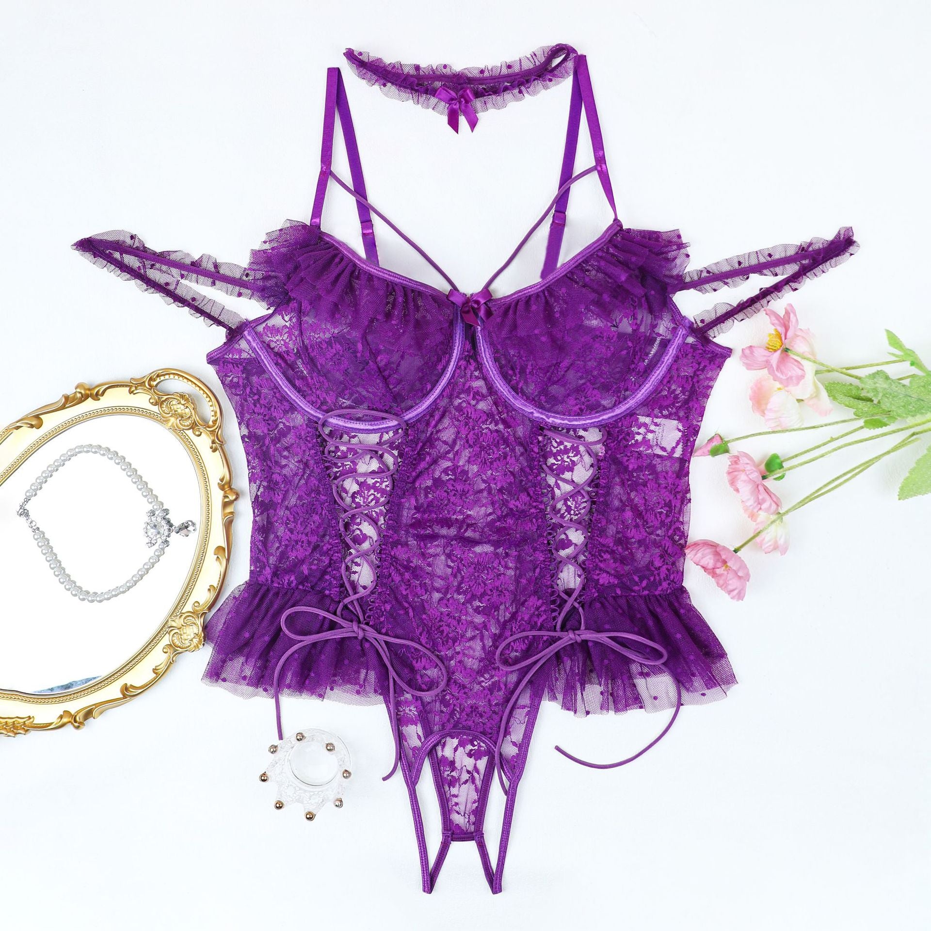 Purple sheer lace bodysuit with underwire cups, ruffled trim, and lace-up detailing